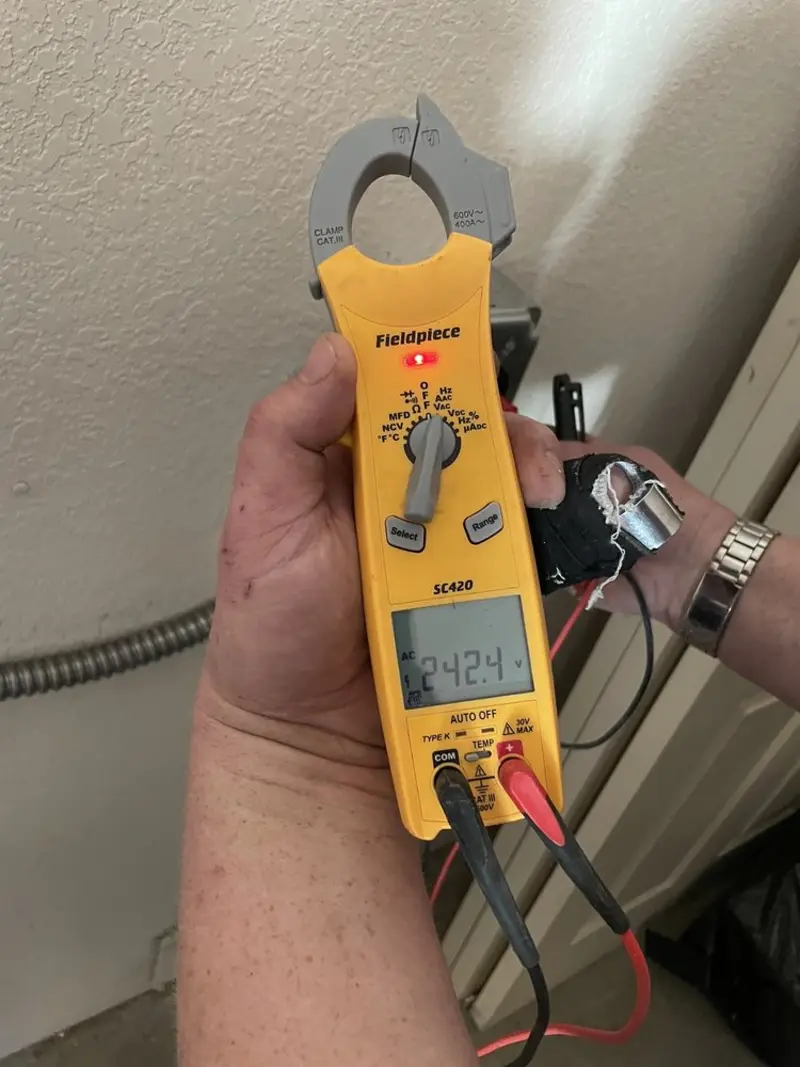 Voltage testing with clamp meter during Circuit Breaker Repair in Northwoods